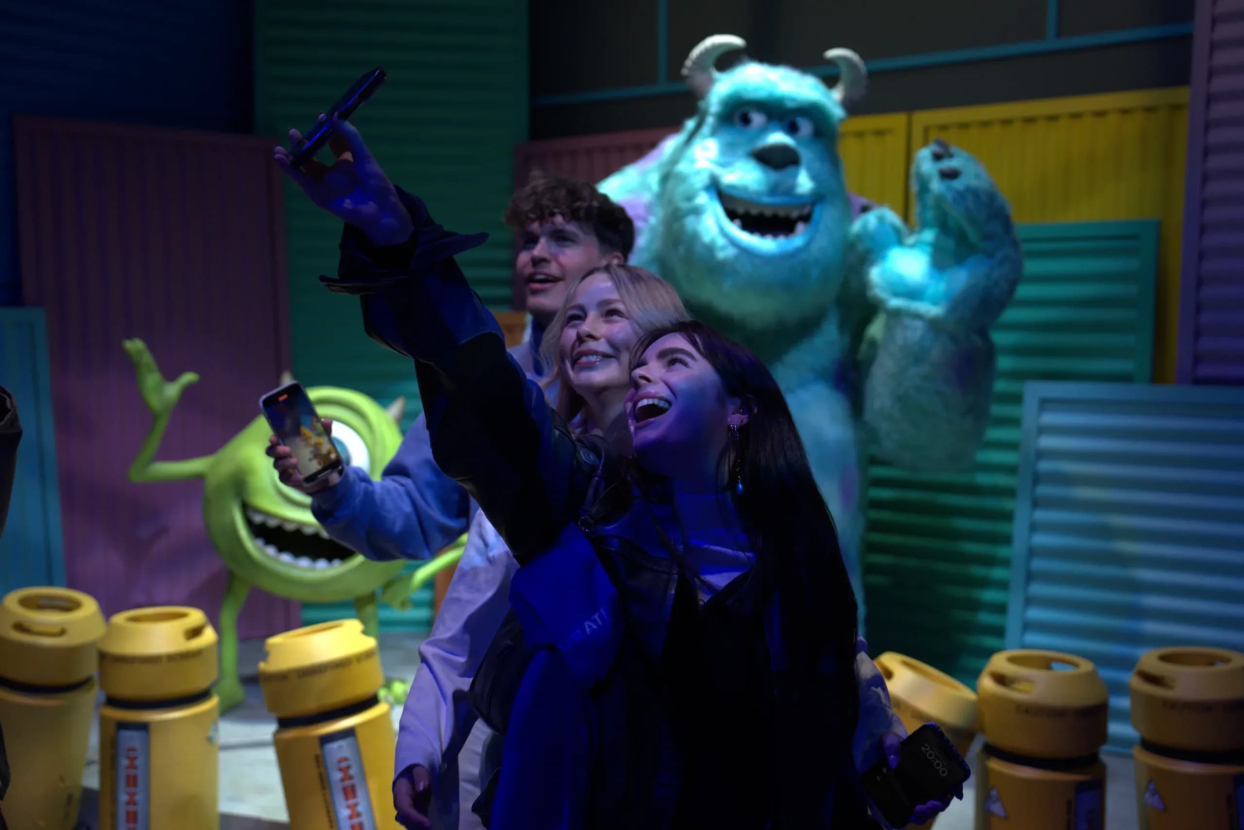 People with Sully from Monsters Inc Room
